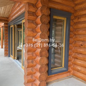 Наружняя отделка деревянного дома из оцилиндрованного бревна под ключ, шлифовка, покраска Городок