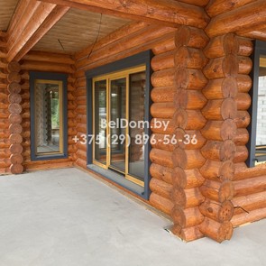 Наружняя отделка деревянного дома из оцилиндрованного бревна под ключ, шлифовка, покраска Верхнедвинск