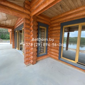 Наружняя отделка деревянного дома из оцилиндрованного бревна под ключ, шлифовка, покраска Заславль