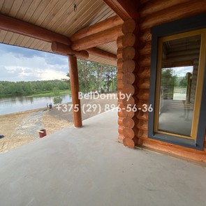 Отделка деревянного дома из крупного оцилиндрованного бревна под ключ Кличев