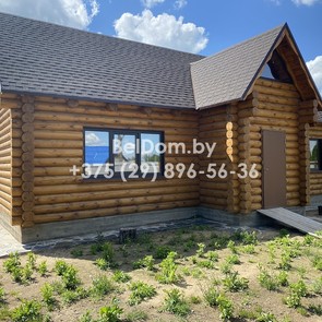 Покраска деревянного дома из оцилиндрованного бревна под Минском